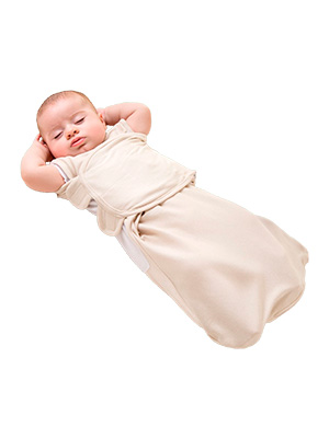 Baby sleeping in an arm free swaddle