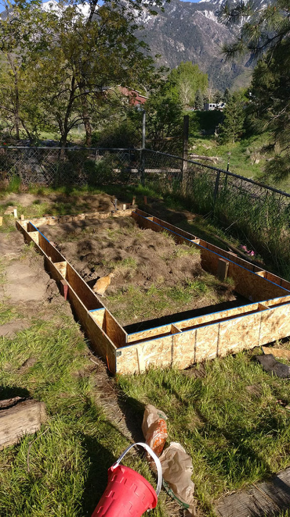 concrete forms for the foundation of the chicken coop, not cinder blocks