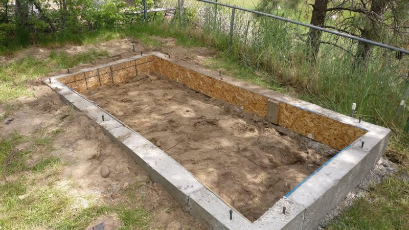 drying cement foundation for chicken coop