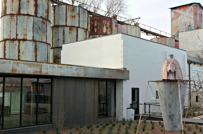 The exterior of the Hill Country Science Mill shows the contrast between the old mill and the new STEM activities happening inside