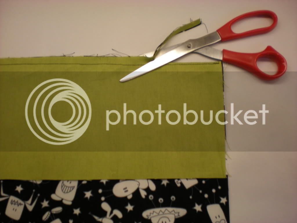 Sew a straight stitch along the edge that you just pinned a 1/4